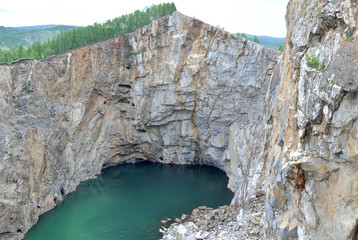 Giant failure, in place of an industrial disaster. Russia. The Failure of Tuim is a technogenic failure at the site of an underground mine closed in 1954 near the village of Tuim (Khakassia)