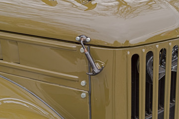 Part of the old car hood latch
