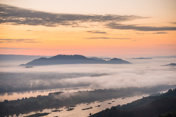 Sunrise and the mist in winter morning