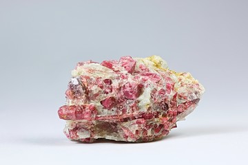 Red tourmaline crystals in spodumene matrix