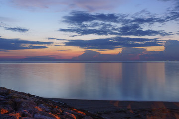 Beautiful sunrise on a calm beach in Bali