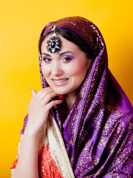 Closeup portrait of young indian girl in sari