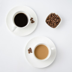 Black and white coffee and coffee beans top view