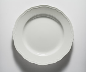 Top view of Empty white round plate