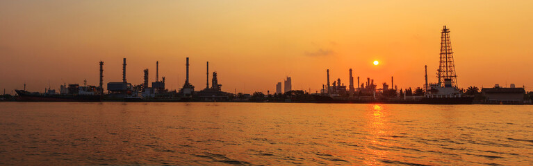 Panorama Oil refinery at the river in sunrise time / Big Factory in sunrise time