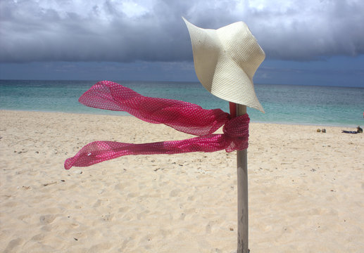 hat, scarf on the beach the island Borakay Filippiny