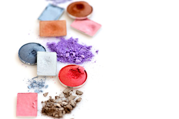 crushed eye shadow isolated on white background with copy space