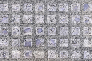 Grey and violet stone pavement background texture