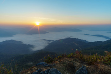 Obraz premium Scenery on the mountain At sunrise Weather Forecast For Thailand From Mid-February Start to spring.