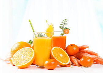 Fresh carrot and orange juice. Healthy drink 
