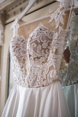 Gorgeous wedding dress on a vintage wardrobe