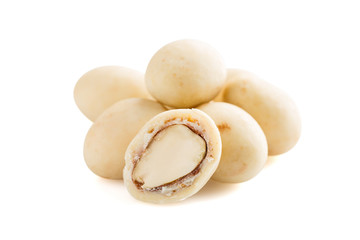 Heap of sugared almonds dragees isolated on white background