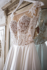 Gorgeous wedding dress on a vintage wardrobe