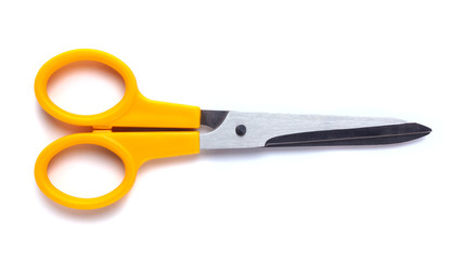 Yellow scissors isolated on a white background
