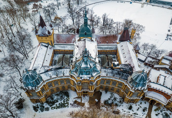 Budapest, Hungary - The beautiful museum of Hungarian Agriculture next to Vajdahunyad Castle in the snowy City Park (Varosliget) at winter time