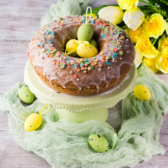 Easter ring cake with decorative festive eggs and sprinkles