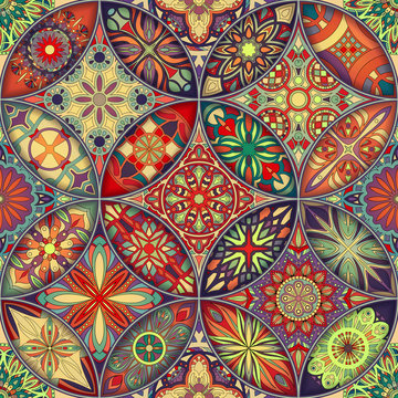 Seamless pattern with decorative mandalas. Vintage mandala elements. Colorful patchwork.