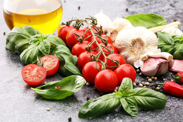 tomato and italian ingredient. Ripe tomatoes with fresh basil, garlic