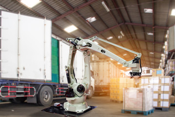 Industry 4.0 Robot concept .The robot arm is working smartly in the shipping department of the factory.