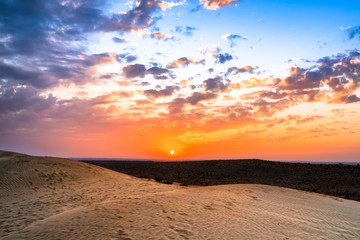 Colorful Sunset over sand dunes at Jaisalmer