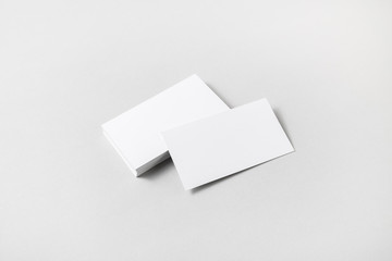 Blank white business cards on paper background. Mockup for ID. Template for graphic designers portfolios.