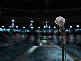 Microphone close-up in empty auditorium