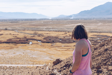 Young Woman in Tank Top Admiring the Desert View