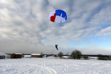 Paratrooper uses a pretty parachute.