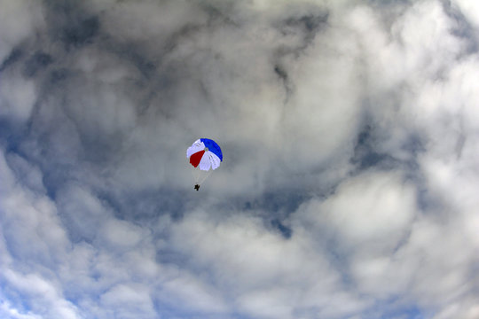 Paratrooper uses a pretty parachute.