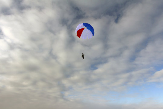Paratrooper uses a pretty parachute.