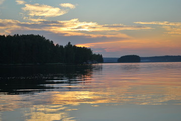 Obraz premium beautiful sunset, colored sky, colored water