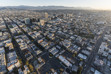 Fototapeta na wymiar Aerial morning view towards Wilshire Bl buildings and Korea Town homes in Los Angeles California.