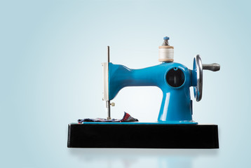 Sewing machine on a blue background