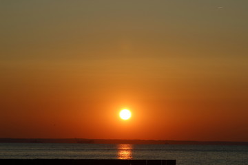 sky sun sunset sea ocean