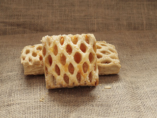 Apple lattices on a hessian surface, texture visible.