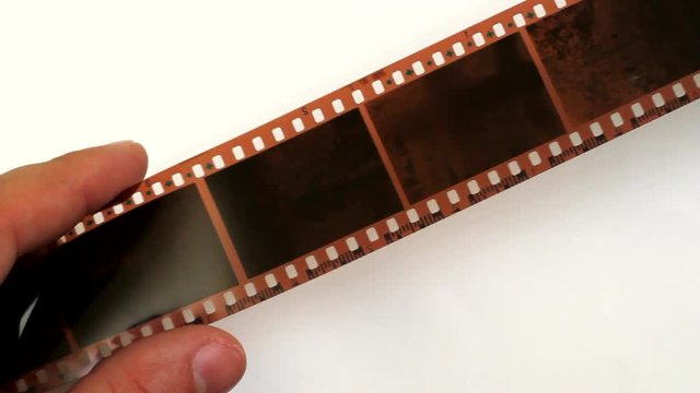 Fingers holding photo film