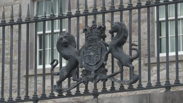 Bronze emblem on a fence