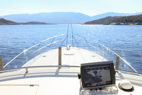 Summer day traveling by the yacht from Athens to Poros island, Greece.
