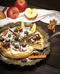 baked apple pie and fresh apples
