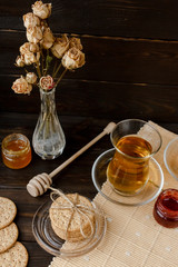 Turkish tea ceremony. Eastern authentic tea time. Breakfast for two people. Cookies, jam, tea, biscuits and rose flowers in a vase on a table cloth. Relaxation.All inclusive room service, Tasty meal