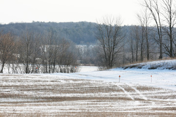 Winter Snowmobile Trail across farmland in the midwest.