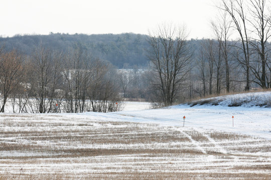 Winter Snowmobile Trail across farmland in the midwest.