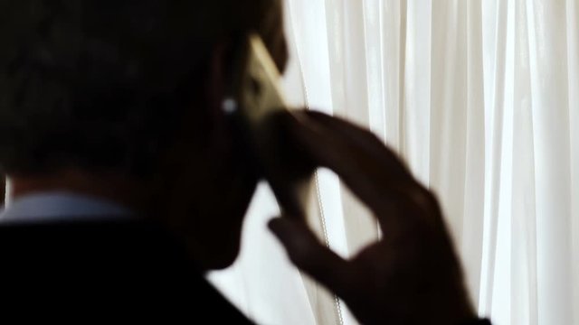 phone tapping -unrecognizable businessman commits financial crimes