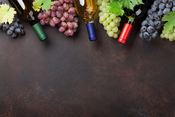 Wine bottles and grapes