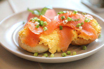 Scrambled eggs with smoked salmon on toast , Breakfast food