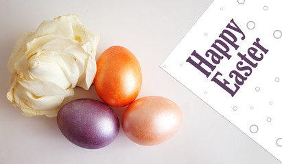 lilac, gold, pink egg, the dried white rose, inscription of 