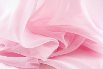 Texture chiffon fabric pink color for backgrounds 

