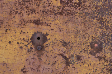 Old worn metal surface with paint. Rusty metal texture. Background. Metal. Wall.