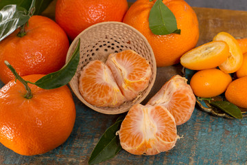 Ripe colorful tropical citrus fruits, mandarins or clementines close up