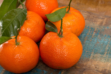 Ripe colorful tropical citrus fruits, mandarins or clementines close up